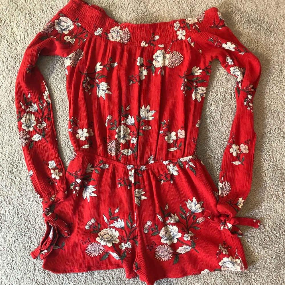 Flirty Red Romper with Flower Design